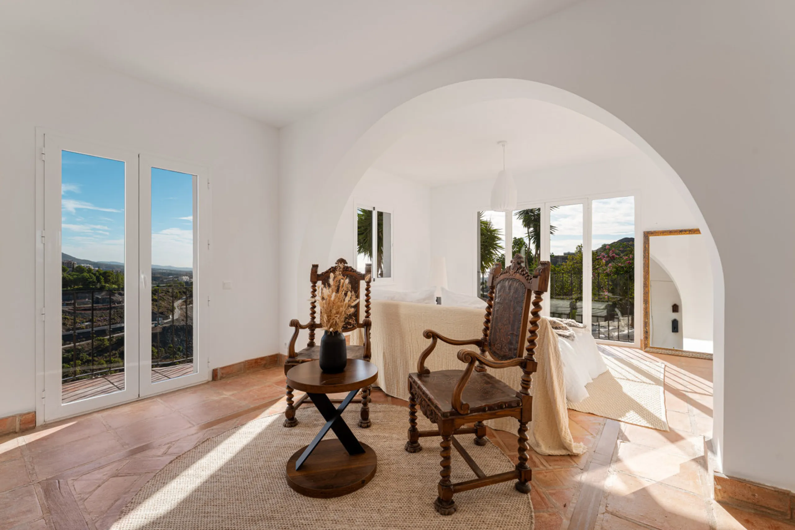 Villa in El Madroñal for sale, offering refined living within the exclusive gated community of El Madroñal 2 in Benahavís, Málaga. This six-bedroom villa with five ensuite bathrooms combines traditional Andalusian features with contemporary design. Built 