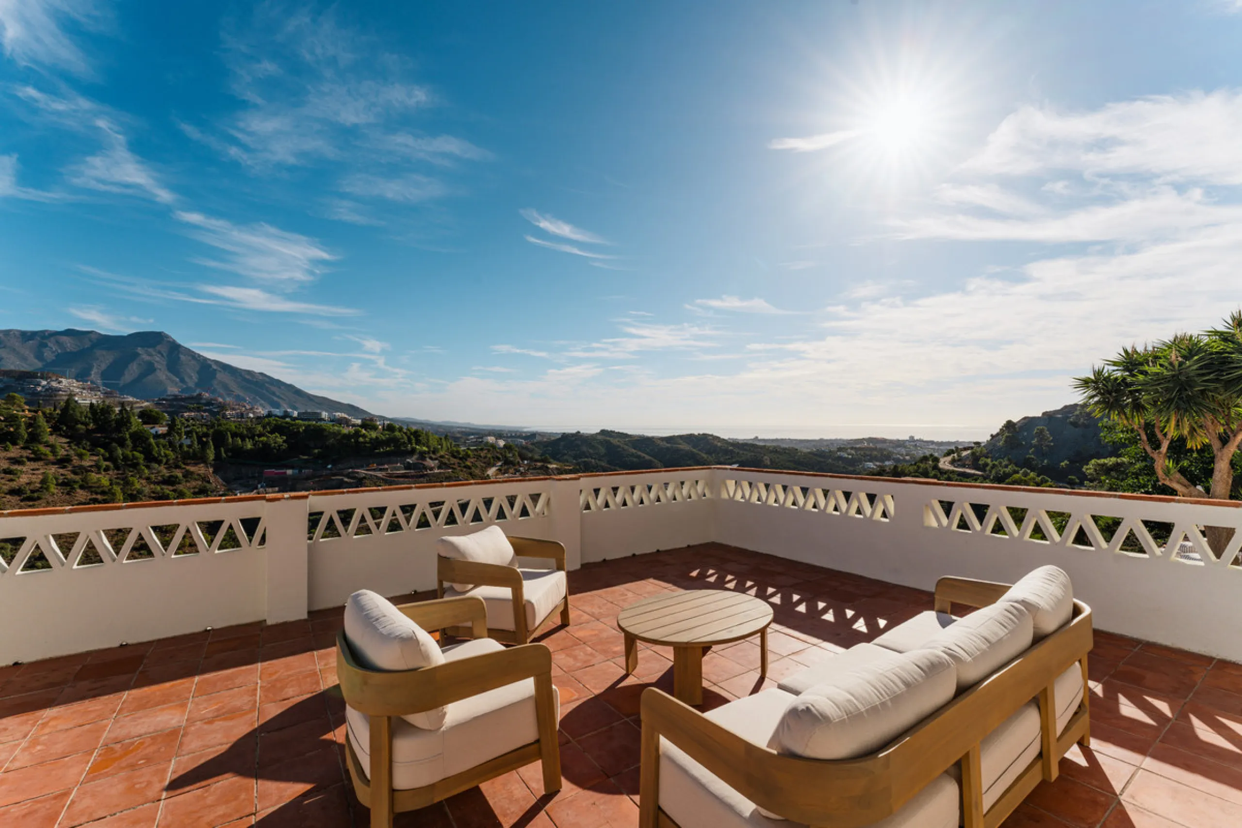 Villa in El Madroñal for sale, offering refined living within the exclusive gated community of El Madroñal 2 in Benahavís, Málaga. This six-bedroom villa with five ensuite bathrooms combines traditional Andalusian features with contemporary design. Built 