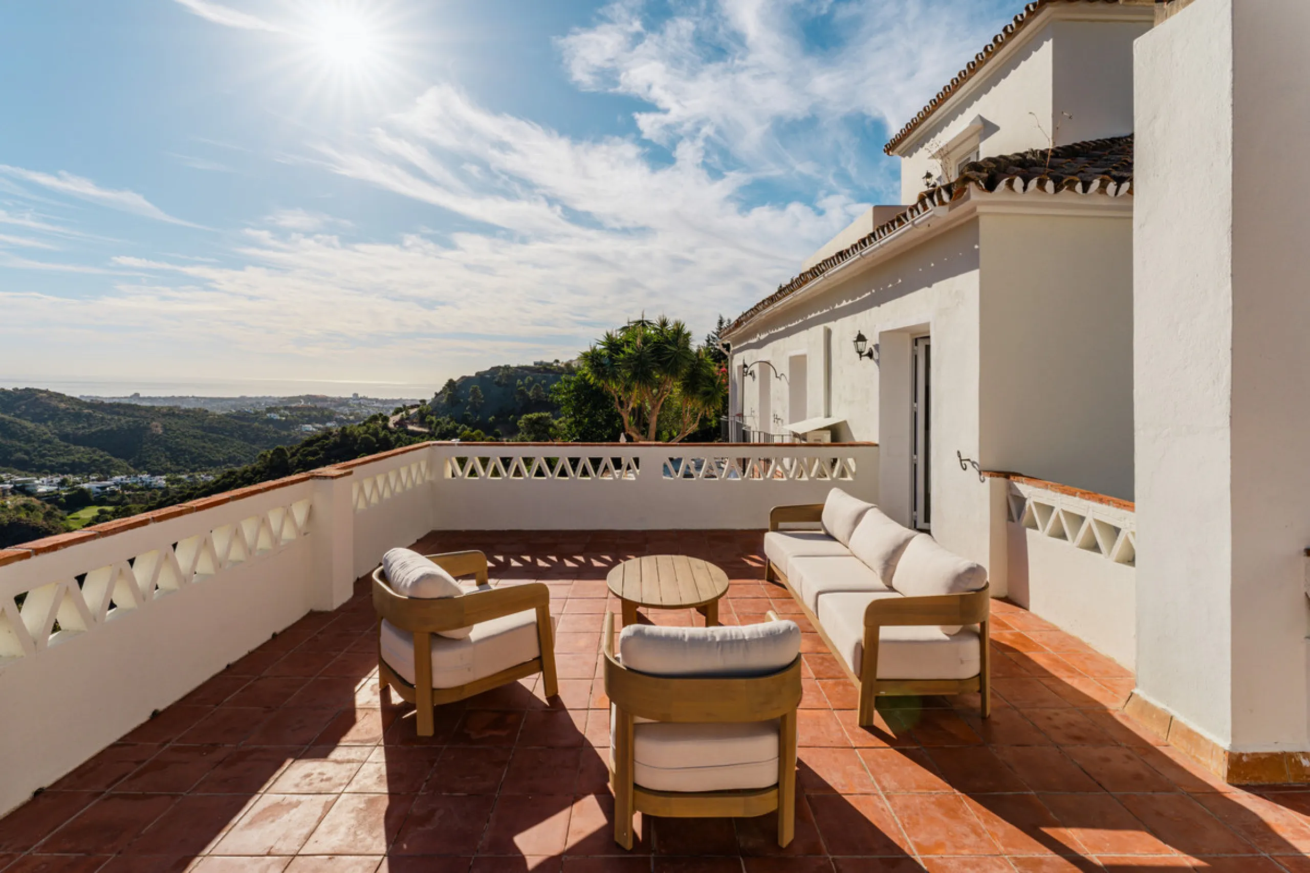 Villa in El Madroñal for sale, offering refined living within the exclusive gated community of El Madroñal 2 in Benahavís, Málaga. This six-bedroom villa with five ensuite bathrooms combines traditional Andalusian features with contemporary design. Built 
