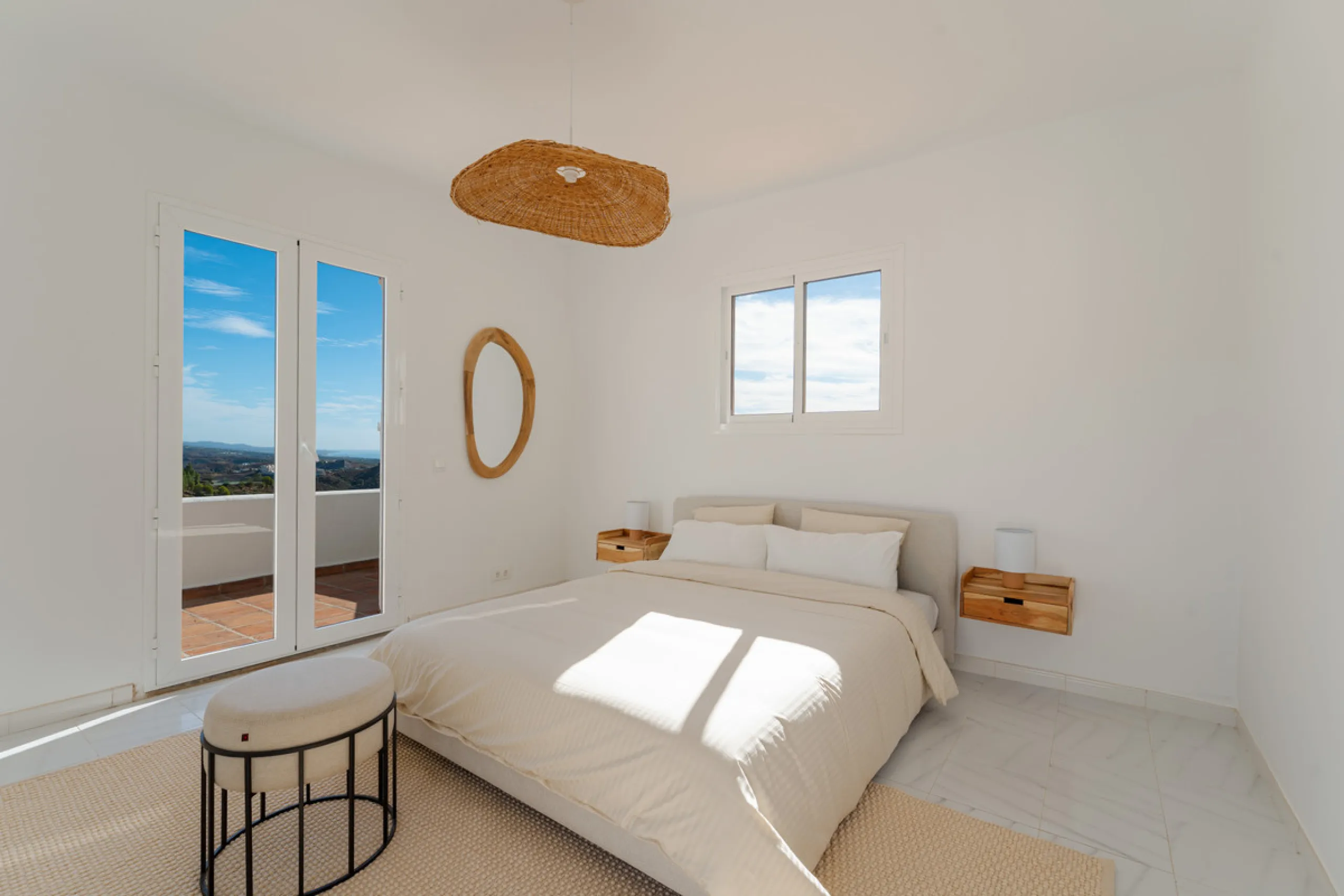 Villa in El Madroñal for sale, offering refined living within the exclusive gated community of El Madroñal 2 in Benahavís, Málaga. This six-bedroom villa with five ensuite bathrooms combines traditional Andalusian features with contemporary design. Built 