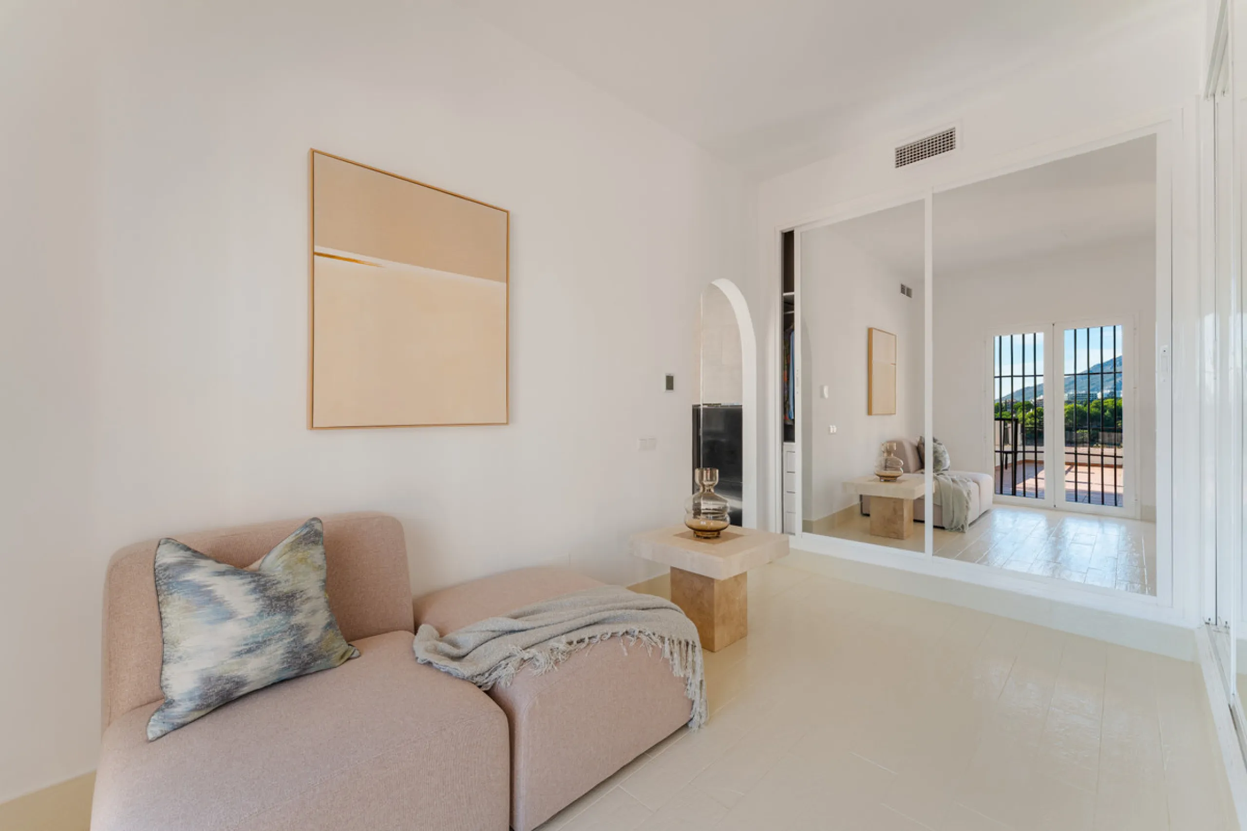 Villa in El Madroñal for sale, offering refined living within the exclusive gated community of El Madroñal 2 in Benahavís, Málaga. This six-bedroom villa with five ensuite bathrooms combines traditional Andalusian features with contemporary design. Built 