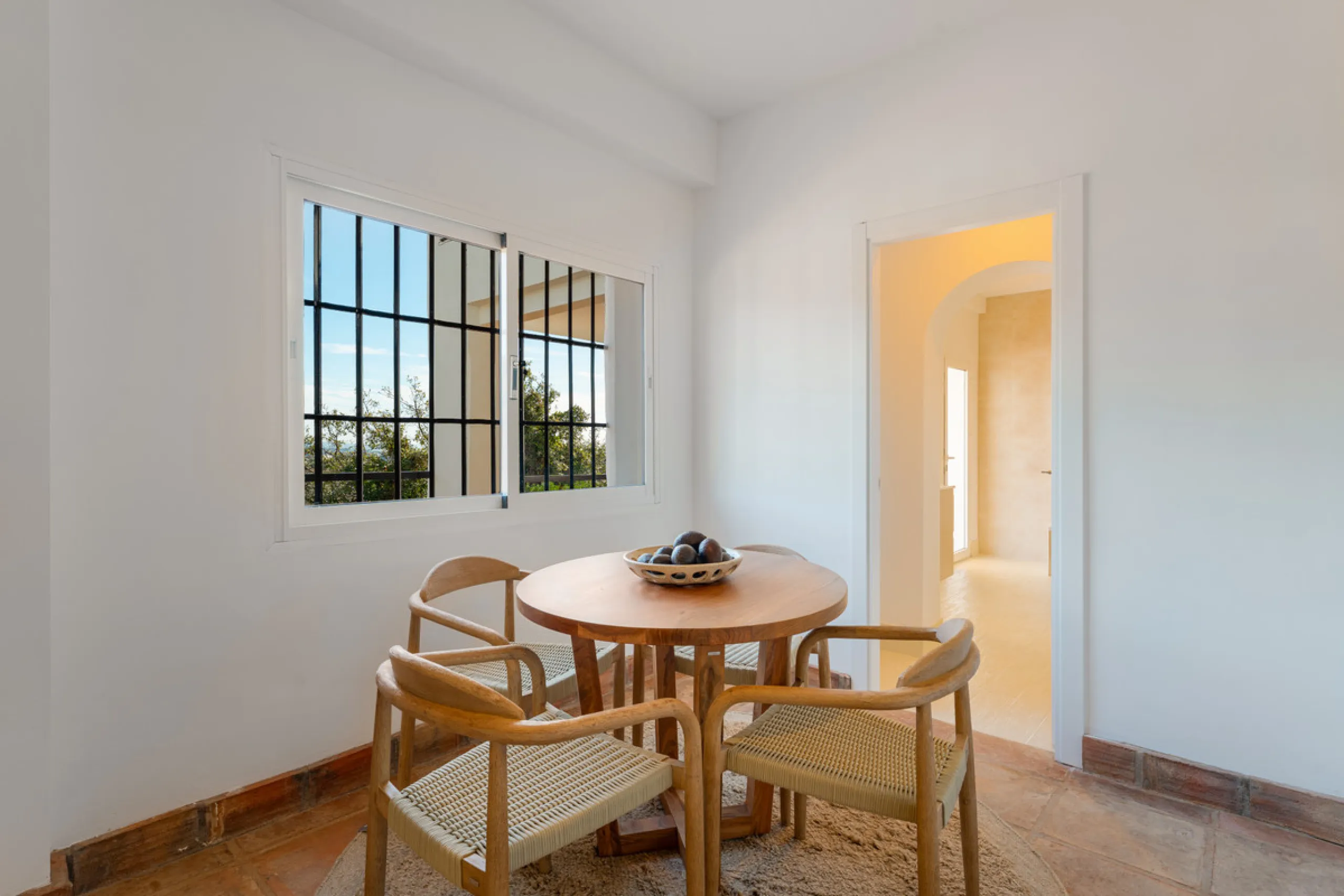 Villa in El Madroñal for sale, offering refined living within the exclusive gated community of El Madroñal 2 in Benahavís, Málaga. This six-bedroom villa with five ensuite bathrooms combines traditional Andalusian features with contemporary design. Built 