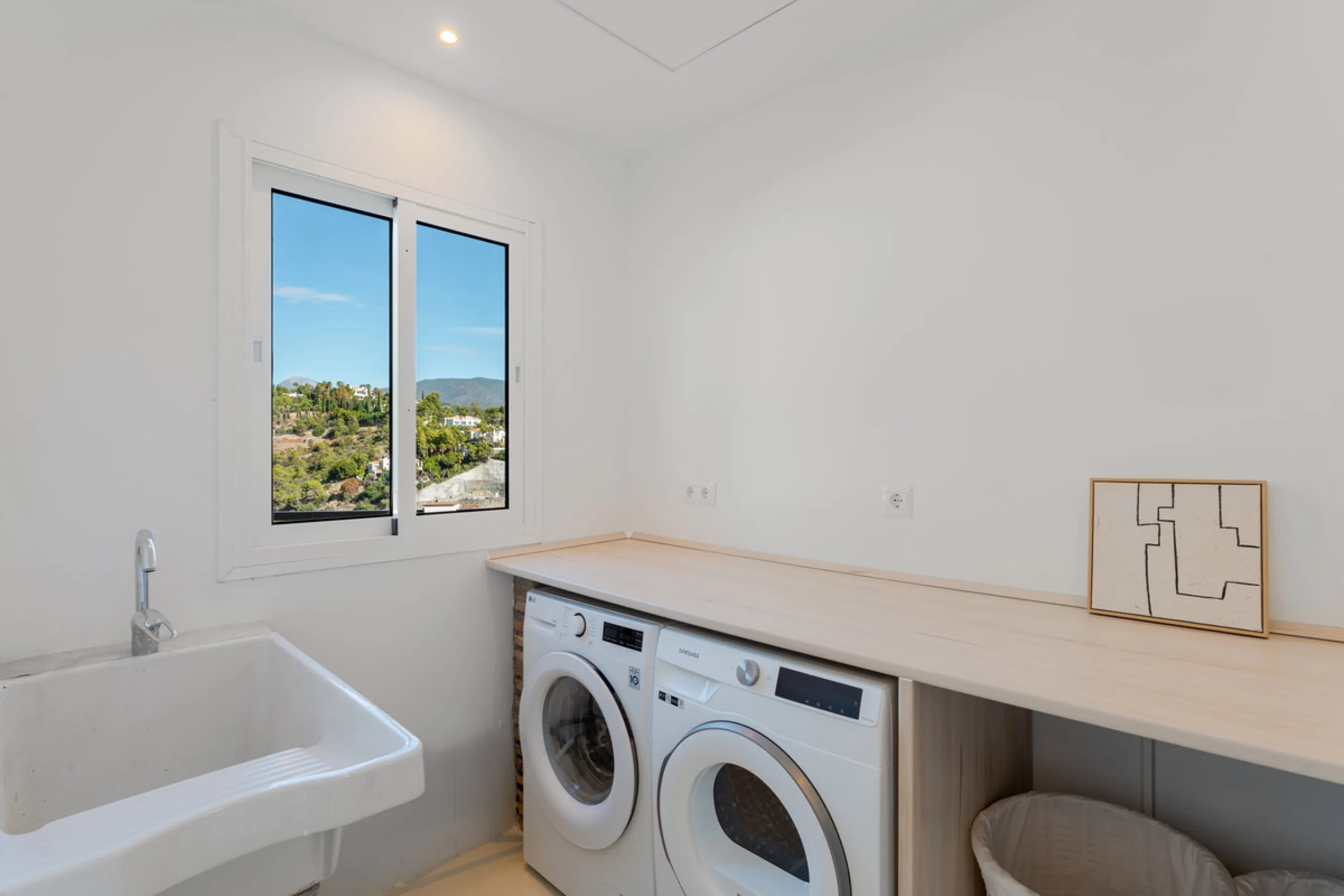 Villa in El Madroñal for sale, offering refined living within the exclusive gated community of El Madroñal 2 in Benahavís, Málaga. This six-bedroom villa with five ensuite bathrooms combines traditional Andalusian features with contemporary design. Built 