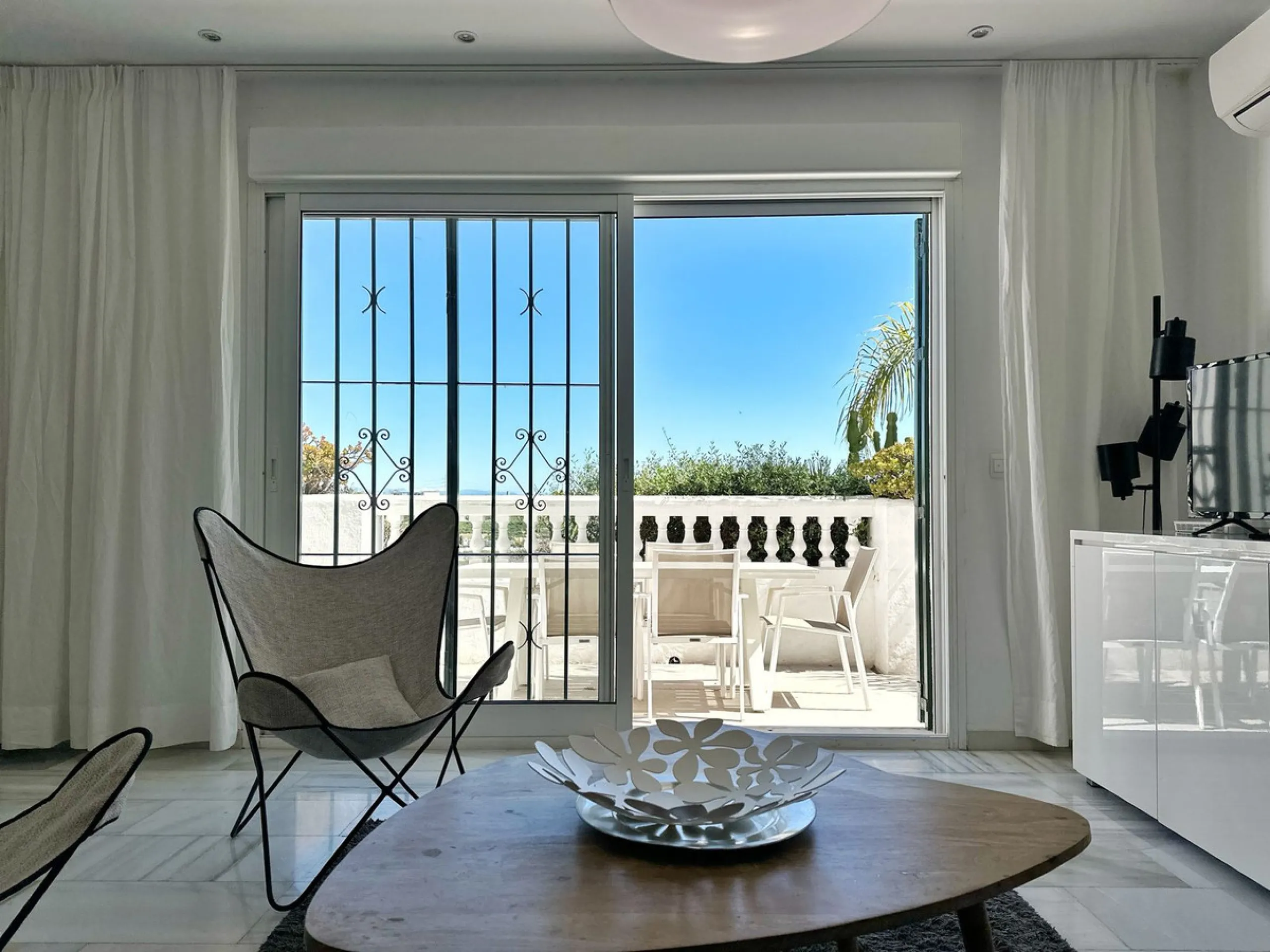 Ground Floor Apartment with Spacious Terrace, South-East Orientation, Mountain Views & Partial Sea View.