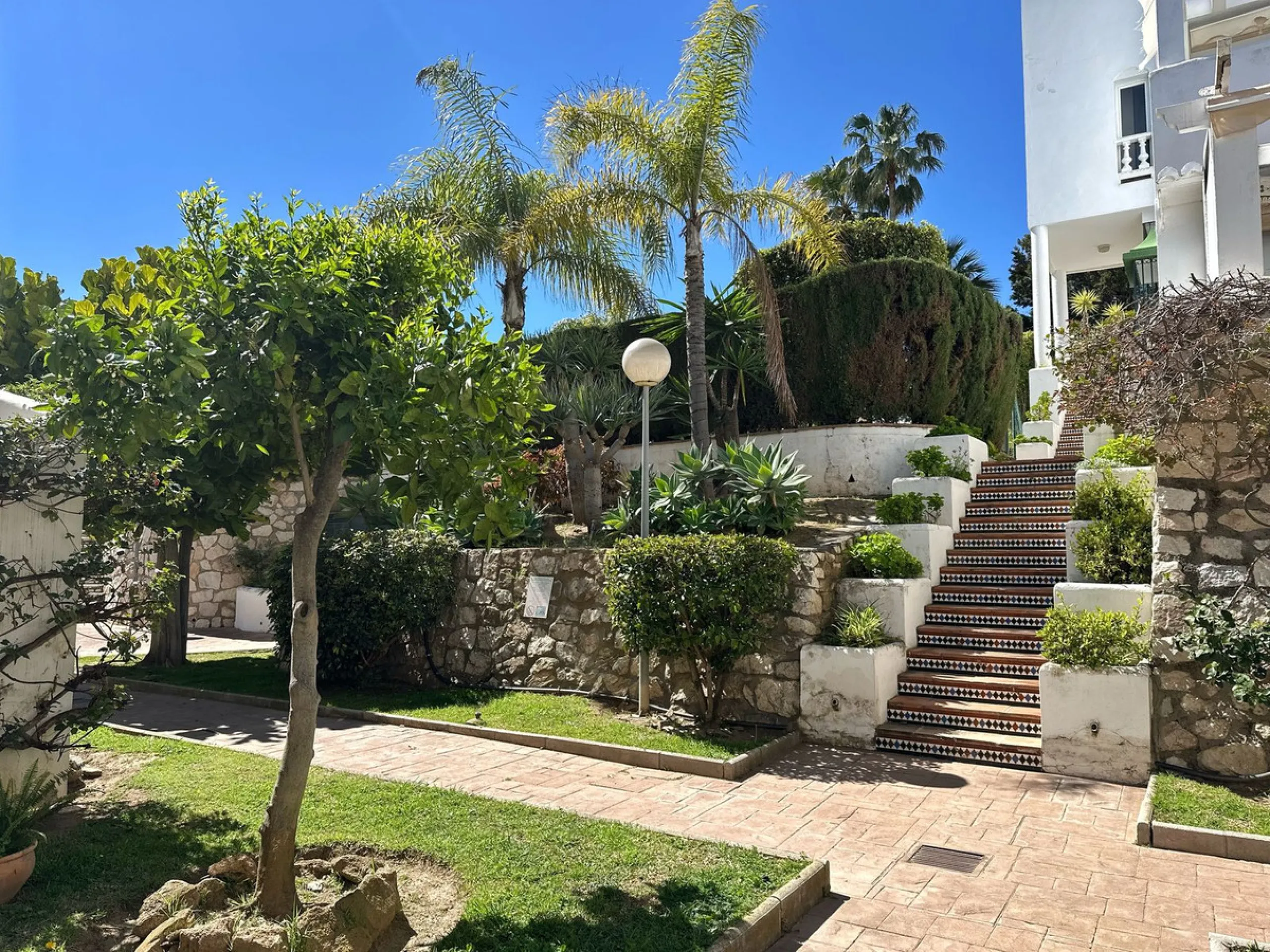 Ground Floor Apartment with Spacious Terrace, South-East Orientation, Mountain Views & Partial Sea View.
