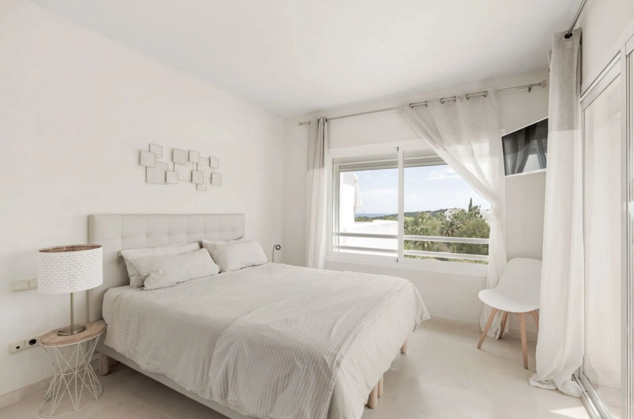 Located in the first phase of the gated Alcazaba Lagoon development, this bright and inviting first-floor apartment delivers an immediate sense of relaxation. The community enjoys a privileged setting just a short drive from Estepona centre, the beach, an