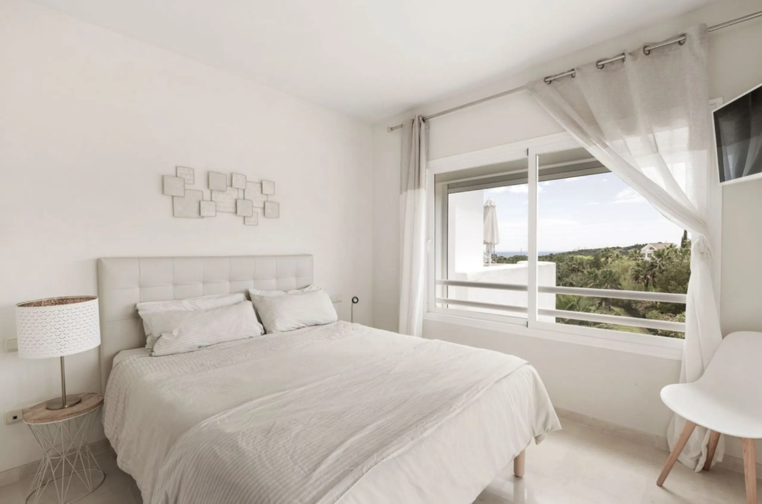 Located in the first phase of the gated Alcazaba Lagoon development, this bright and inviting first-floor apartment delivers an immediate sense of relaxation. The community enjoys a privileged setting just a short drive from Estepona centre, the beach, an