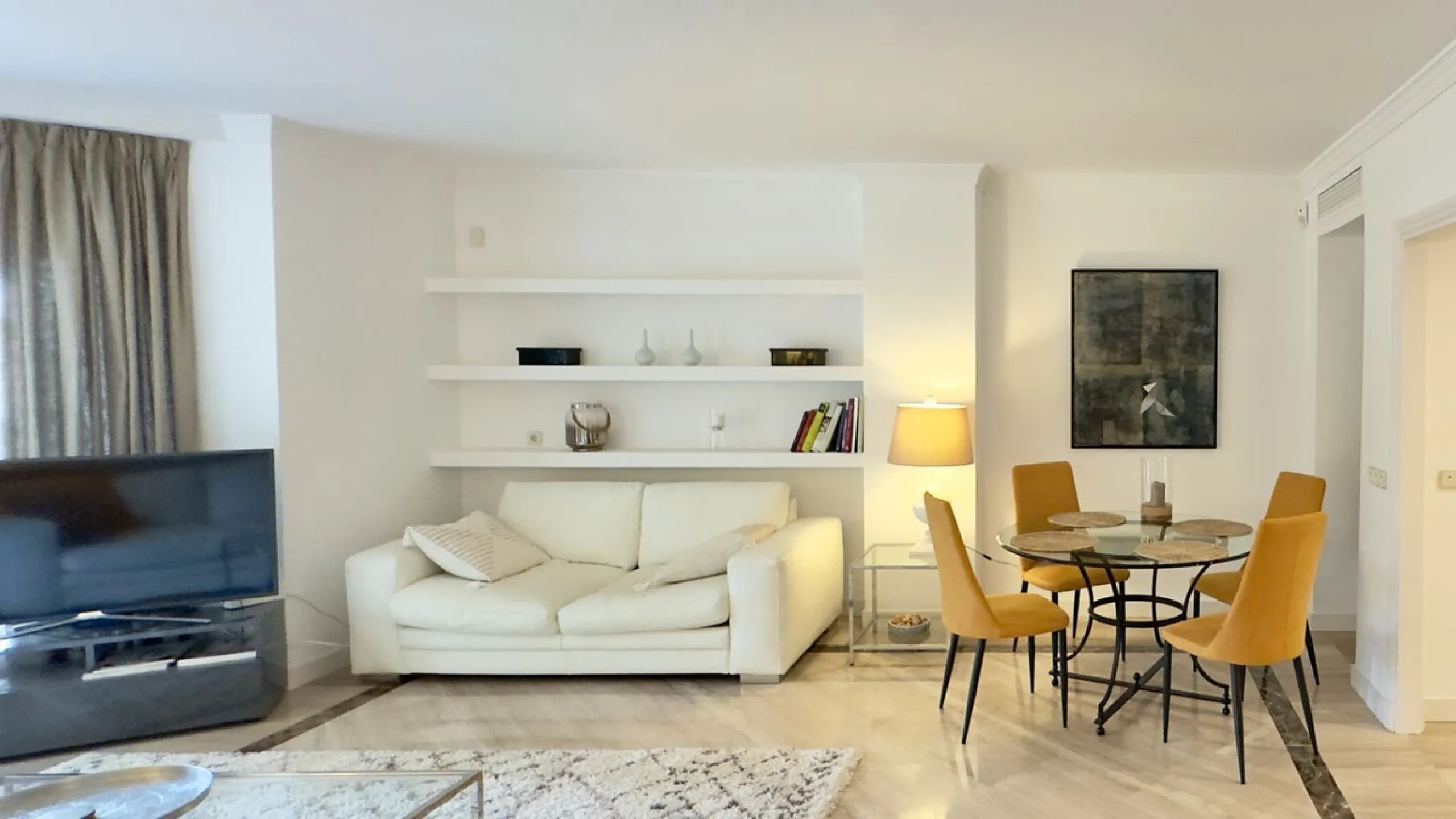This beautiful and luxurious 2-bedroom, 2-bathroom timeless and elegant property is located in the privileged beachside area of Elviria, within the prestigious urbanization of Hacienda Playa.