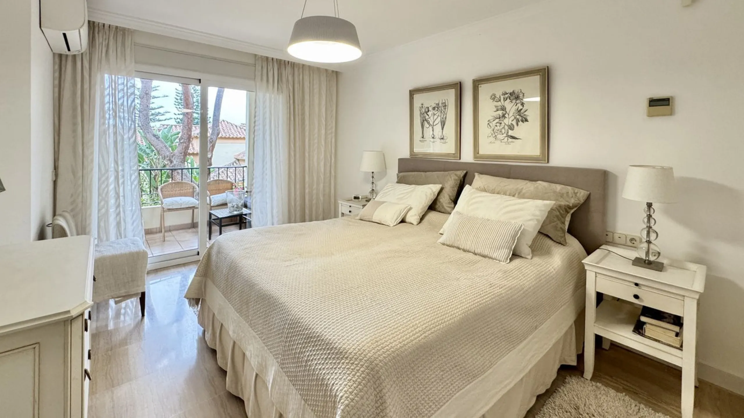This beautiful and luxurious 2-bedroom, 2-bathroom timeless and elegant property is located in the privileged beachside area of Elviria, within the prestigious urbanization of Hacienda Playa.