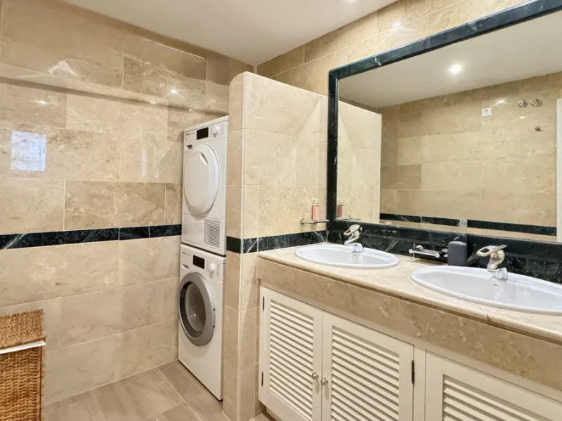 This beautiful and luxurious 2-bedroom, 2-bathroom timeless and elegant property is located in the privileged beachside area of Elviria, within the prestigious urbanization of Hacienda Playa.