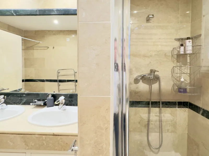 This beautiful and luxurious 2-bedroom, 2-bathroom timeless and elegant property is located in the privileged beachside area of Elviria, within the prestigious urbanization of Hacienda Playa.