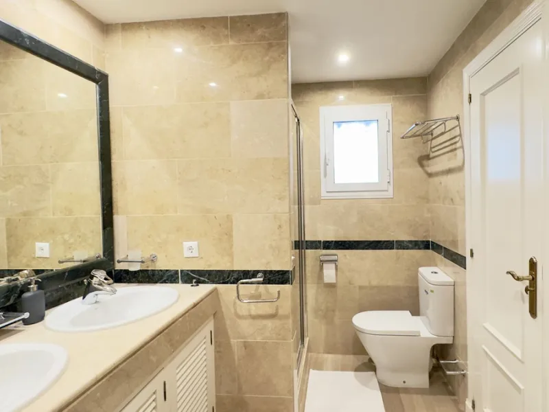 This beautiful and luxurious 2-bedroom, 2-bathroom timeless and elegant property is located in the privileged beachside area of Elviria, within the prestigious urbanization of Hacienda Playa.