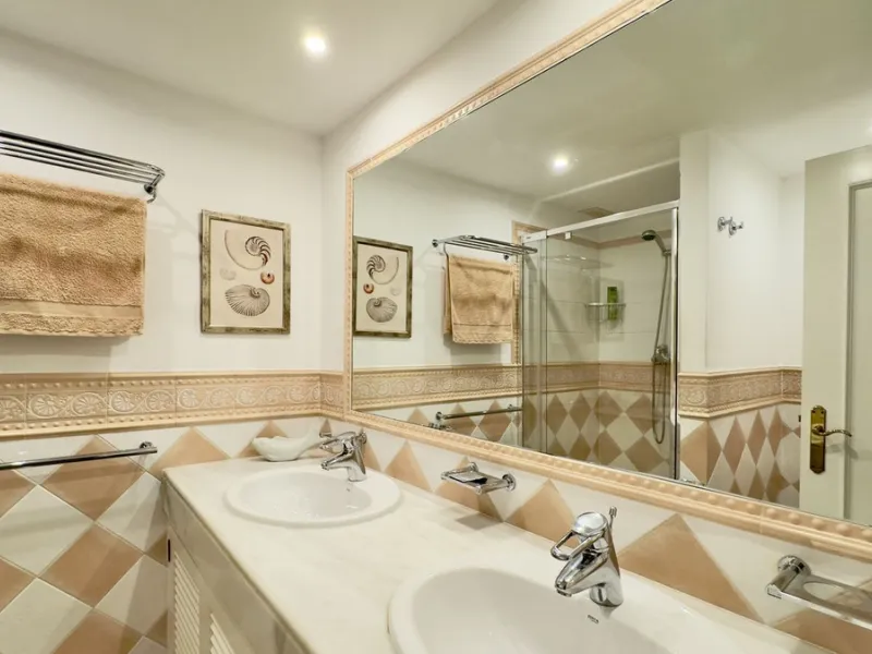 This beautiful and luxurious 2-bedroom, 2-bathroom timeless and elegant property is located in the privileged beachside area of Elviria, within the prestigious urbanization of Hacienda Playa.