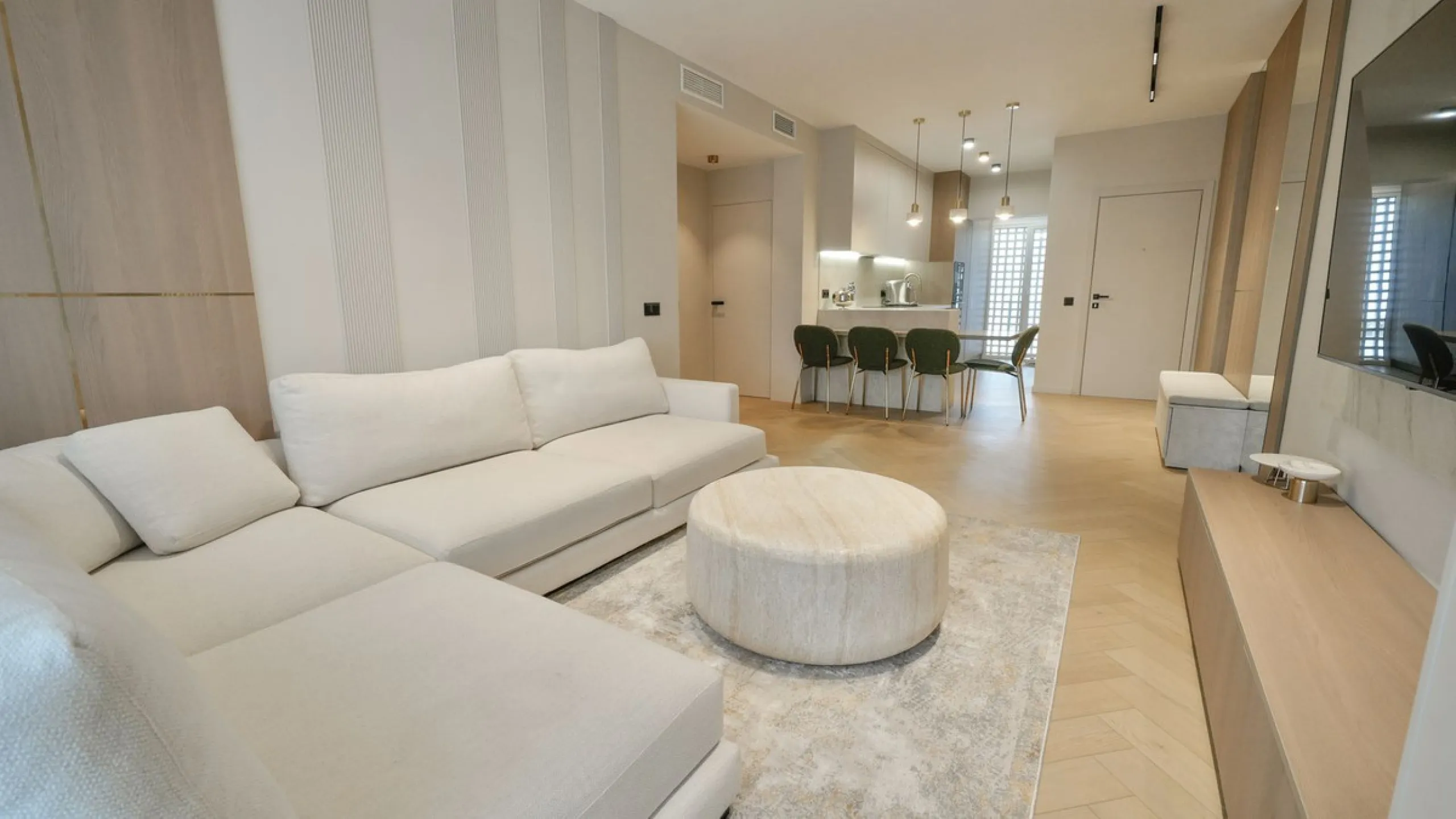 This modern two-bedroom apartment has been completely renovated this year — everything is brand new. The renovation was done in a contemporary style, using high-quality materials and a well-thought-out design. It was made for personal use, with great atte