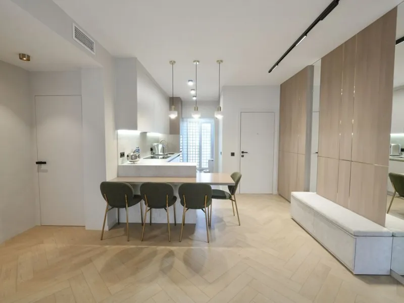 This modern two-bedroom apartment has been completely renovated this year — everything is brand new. The renovation was done in a contemporary style, using high-quality materials and a well-thought-out design. It was made for personal use, with great atte