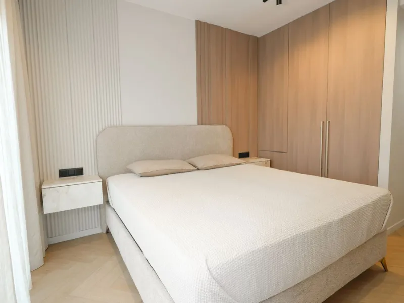 This modern two-bedroom apartment has been completely renovated this year — everything is brand new. The renovation was done in a contemporary style, using high-quality materials and a well-thought-out design. It was made for personal use, with great atte