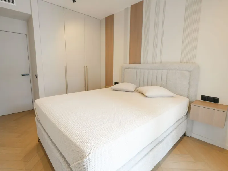This modern two-bedroom apartment has been completely renovated this year — everything is brand new. The renovation was done in a contemporary style, using high-quality materials and a well-thought-out design. It was made for personal use, with great atte