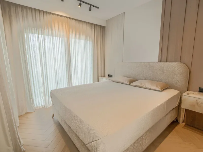This modern two-bedroom apartment has been completely renovated this year — everything is brand new. The renovation was done in a contemporary style, using high-quality materials and a well-thought-out design. It was made for personal use, with great atte