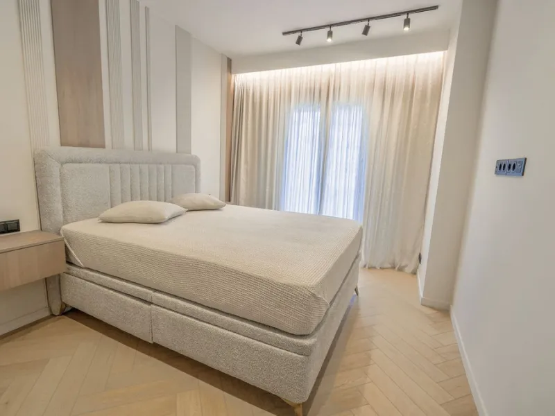 This modern two-bedroom apartment has been completely renovated this year — everything is brand new. The renovation was done in a contemporary style, using high-quality materials and a well-thought-out design. It was made for personal use, with great atte