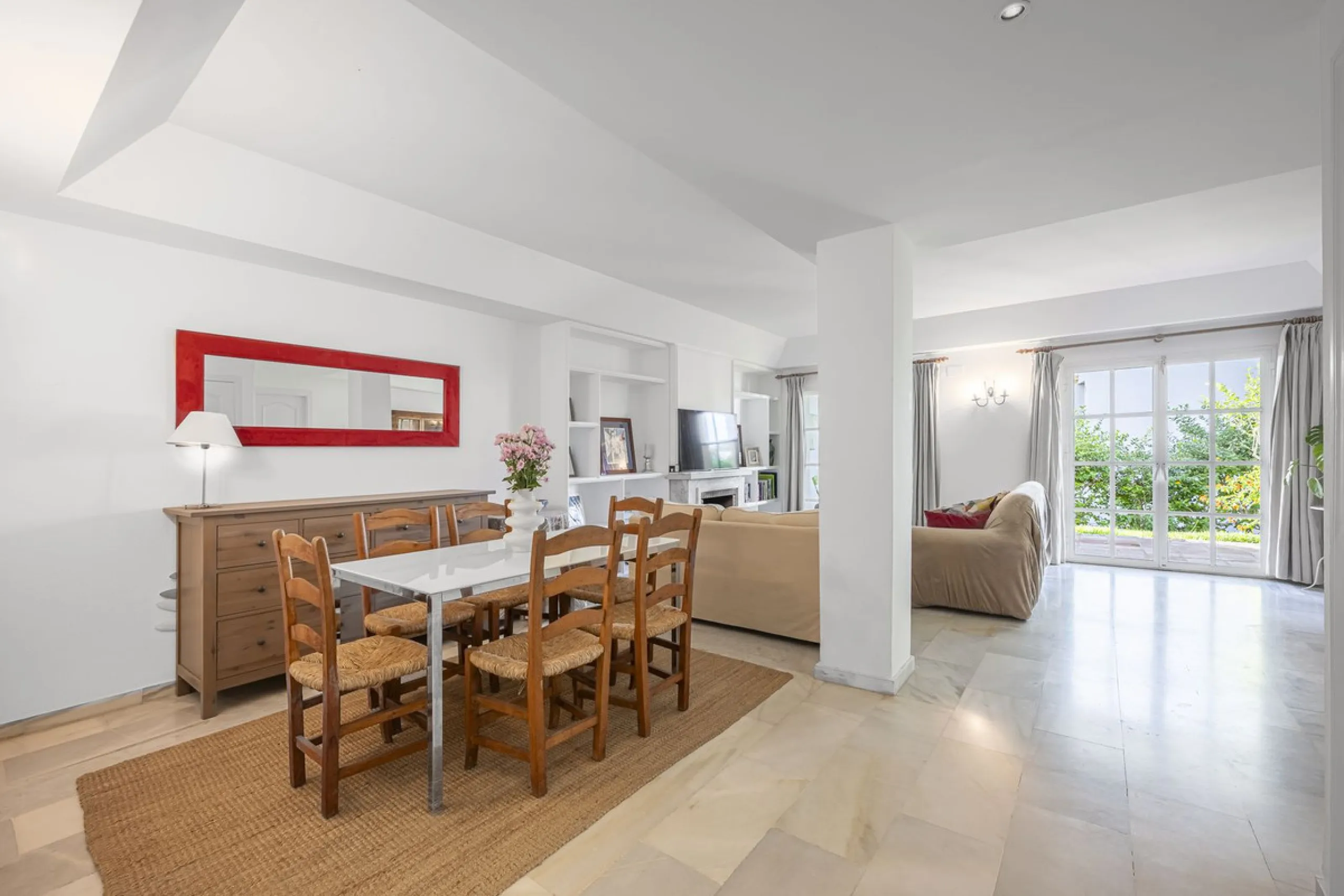 This stunning semi-detached villa is located in a traditional Andalusian development on the New Golden Mile. It is ideally located a short drive from Puerto Banús, with the beach just a short walk away.