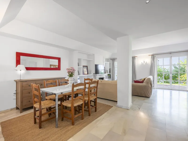 This stunning semi-detached villa is located in a traditional Andalusian development on the New Golden Mile. It is ideally located a short drive from Puerto Banús, with the beach just a short walk away.