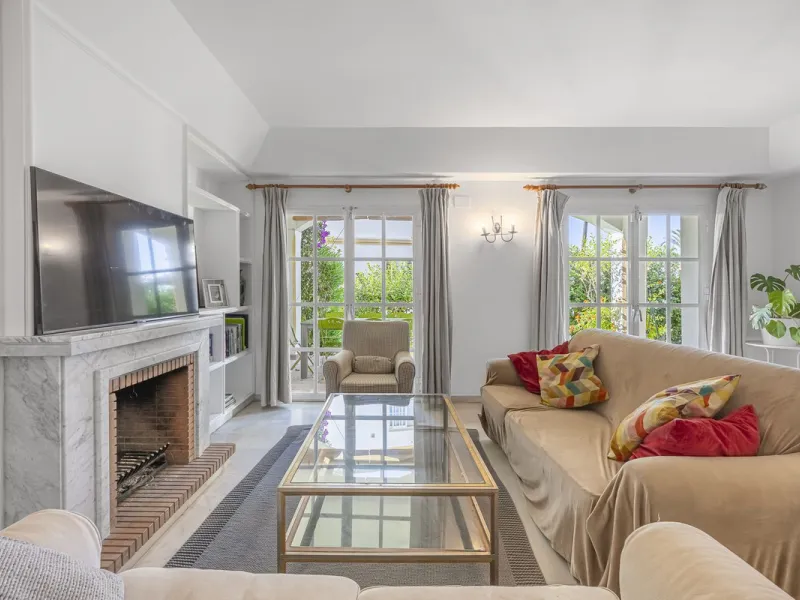 This stunning semi-detached villa is located in a traditional Andalusian development on the New Golden Mile. It is ideally located a short drive from Puerto Banús, with the beach just a short walk away.