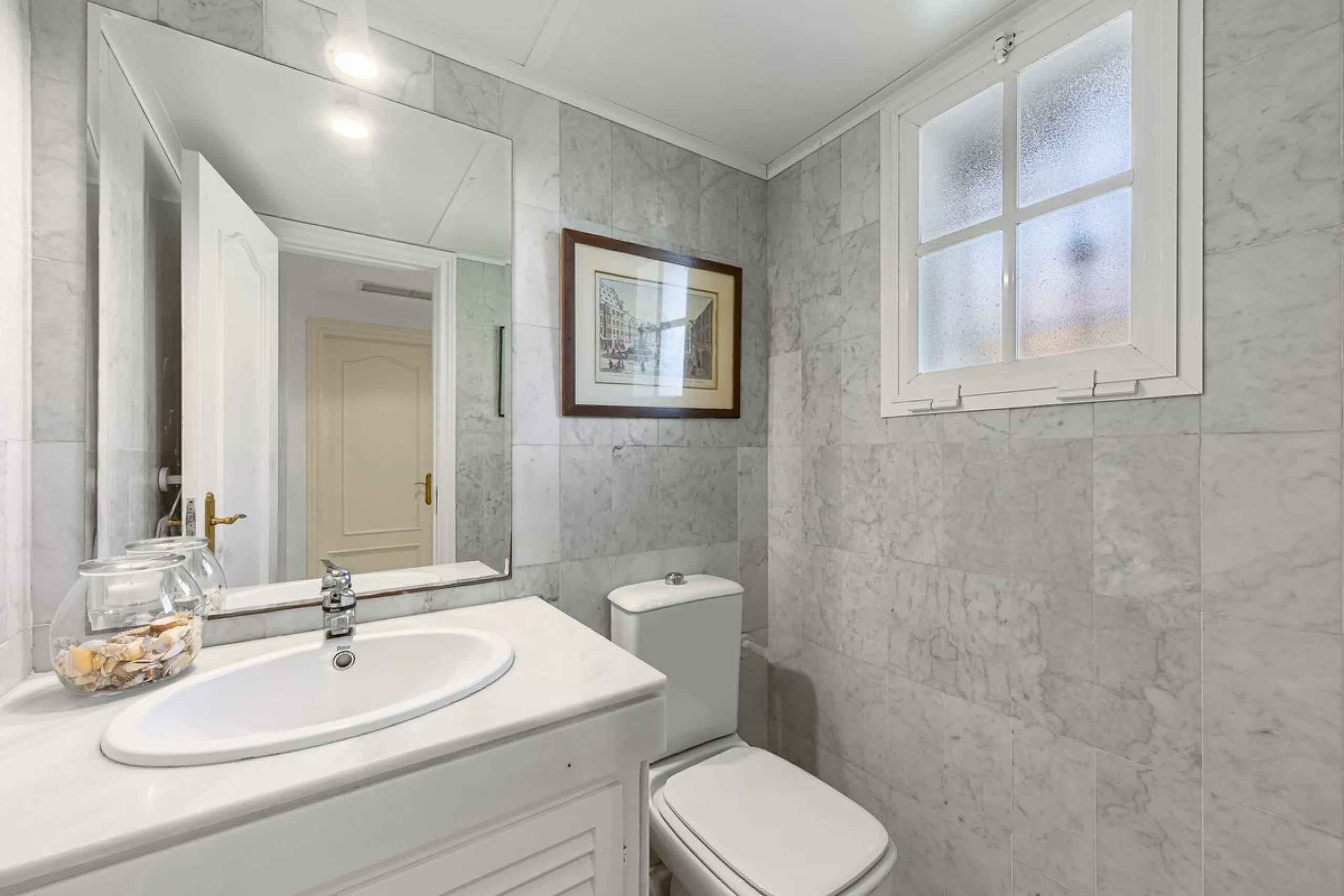 This stunning semi-detached villa is located in a traditional Andalusian development on the New Golden Mile. It is ideally located a short drive from Puerto Banús, with the beach just a short walk away.