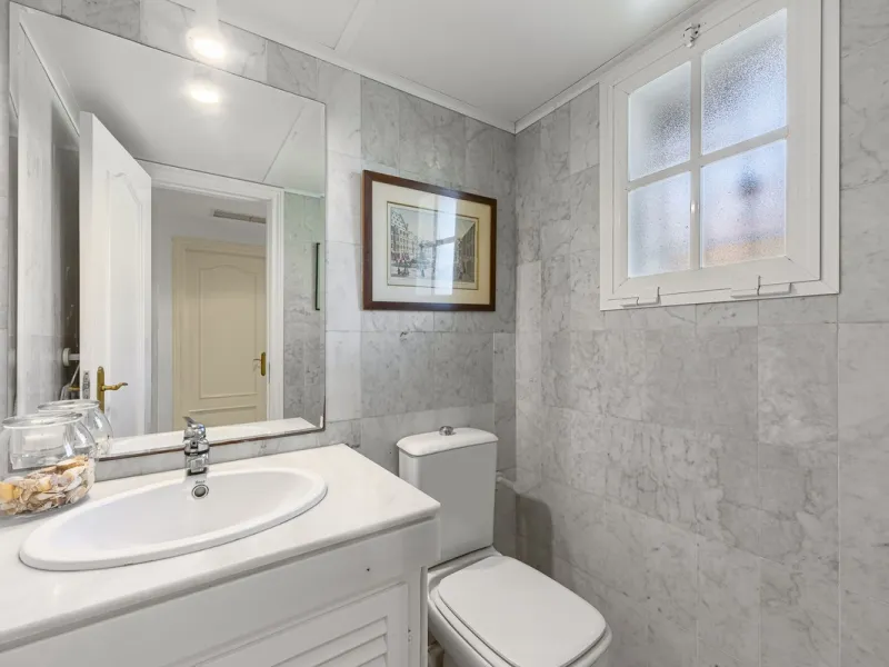 This stunning semi-detached villa is located in a traditional Andalusian development on the New Golden Mile. It is ideally located a short drive from Puerto Banús, with the beach just a short walk away.