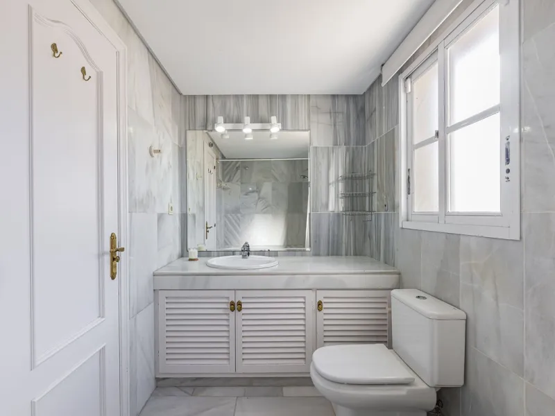 This stunning semi-detached villa is located in a traditional Andalusian development on the New Golden Mile. It is ideally located a short drive from Puerto Banús, with the beach just a short walk away.