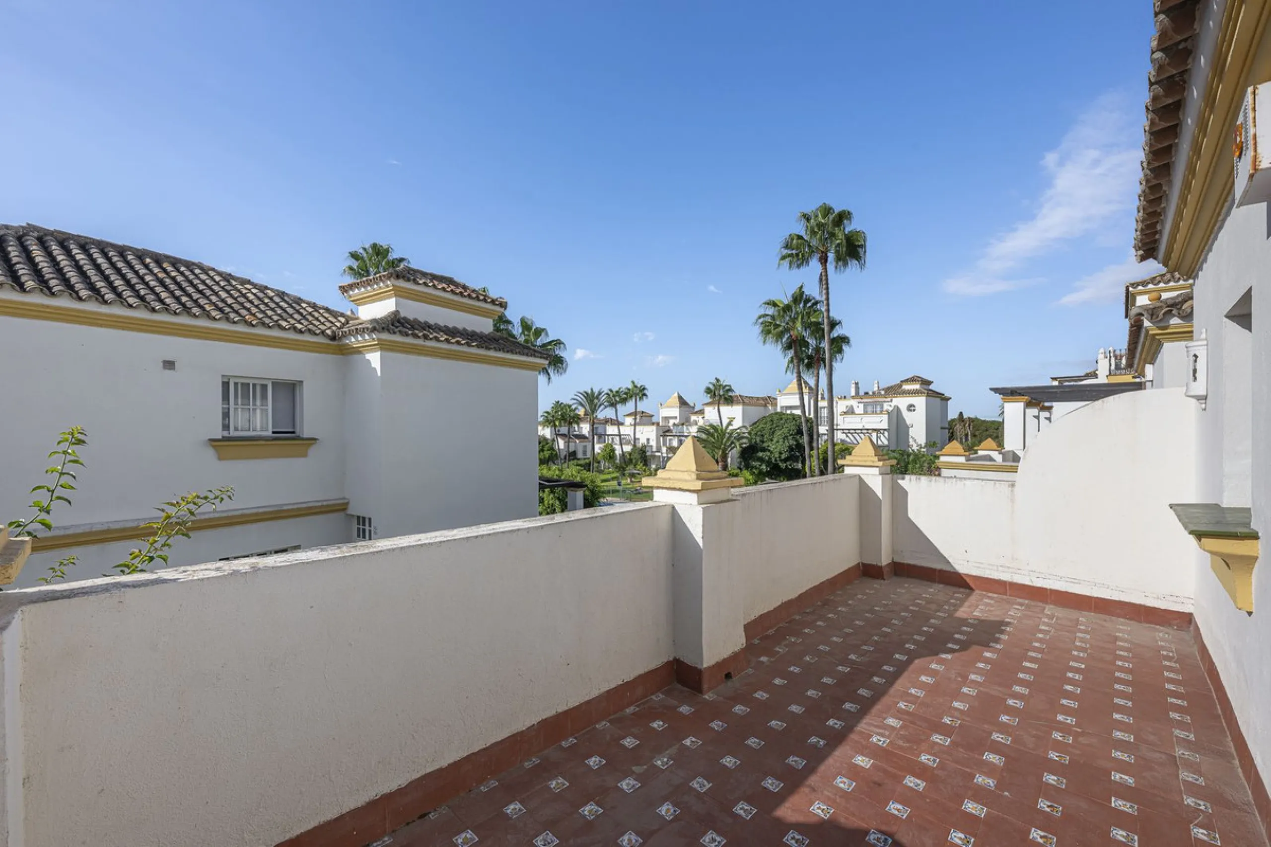 This stunning semi-detached villa is located in a traditional Andalusian development on the New Golden Mile. It is ideally located a short drive from Puerto Banús, with the beach just a short walk away.