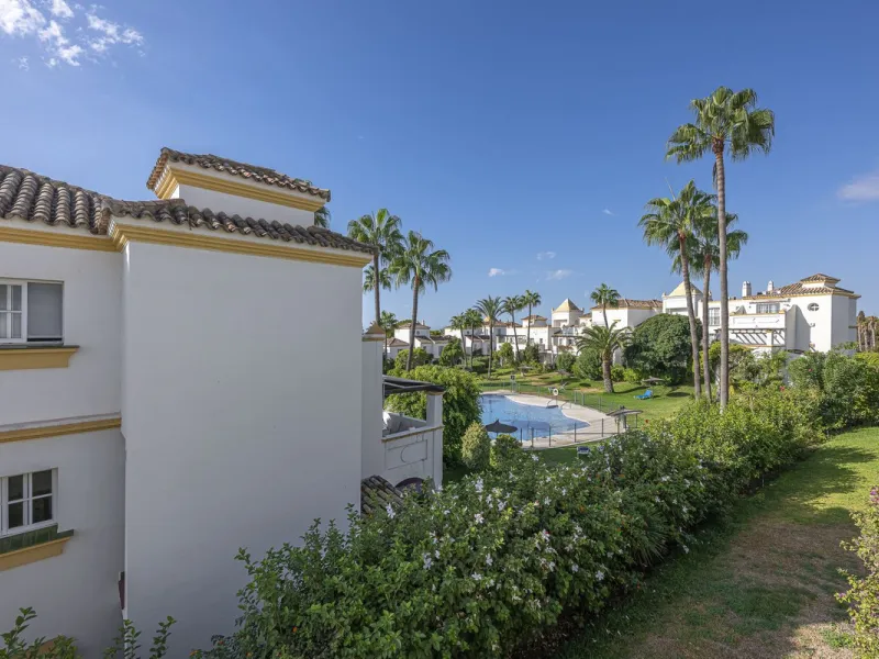 This stunning semi-detached villa is located in a traditional Andalusian development on the New Golden Mile. It is ideally located a short drive from Puerto Banús, with the beach just a short walk away.
