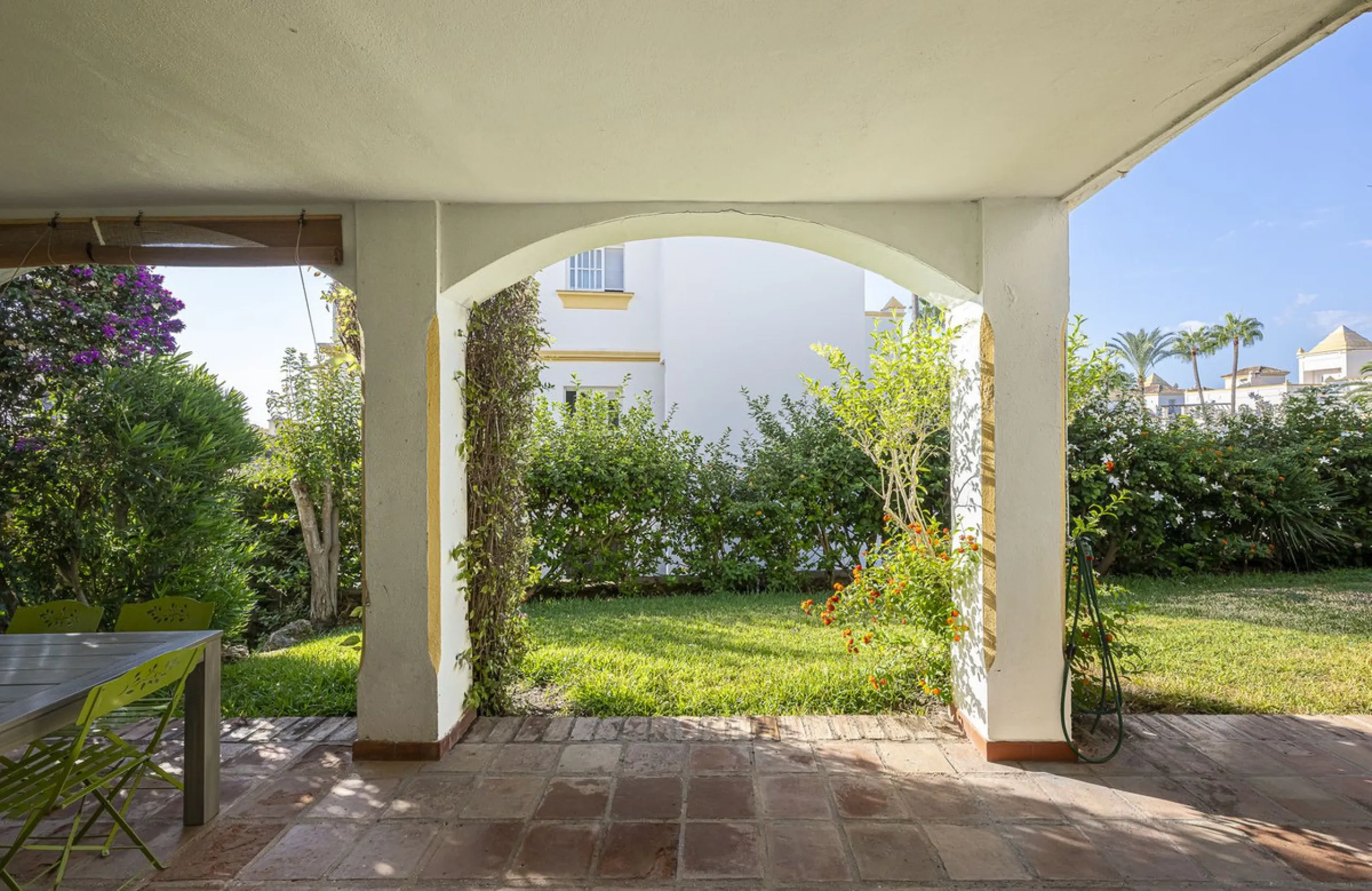 This stunning semi-detached villa is located in a traditional Andalusian development on the New Golden Mile. It is ideally located a short drive from Puerto Banús, with the beach just a short walk away.