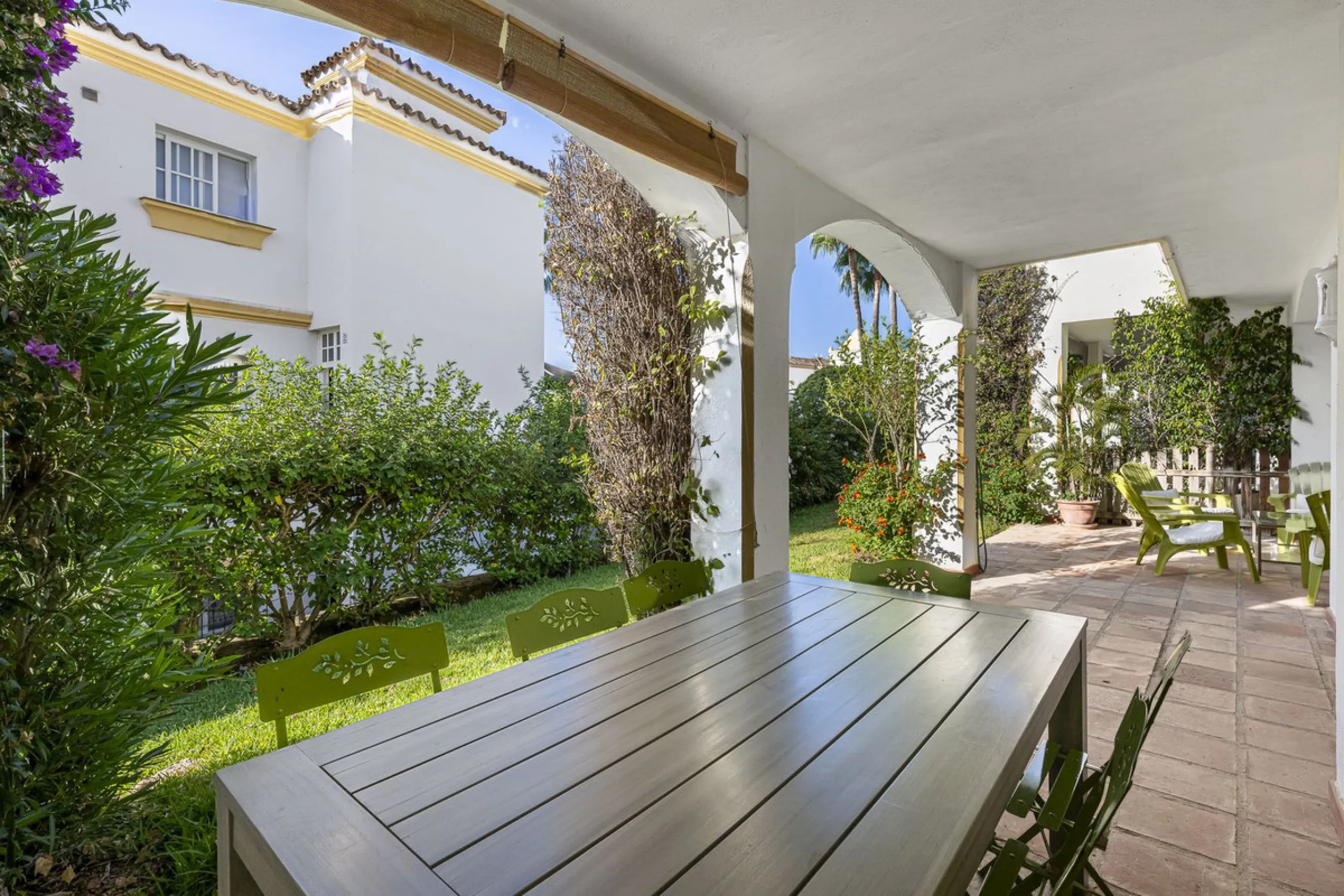 This stunning semi-detached villa is located in a traditional Andalusian development on the New Golden Mile. It is ideally located a short drive from Puerto Banús, with the beach just a short walk away.