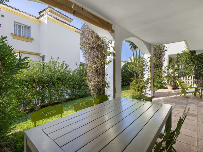 This stunning semi-detached villa is located in a traditional Andalusian development on the New Golden Mile. It is ideally located a short drive from Puerto Banús, with the beach just a short walk away.