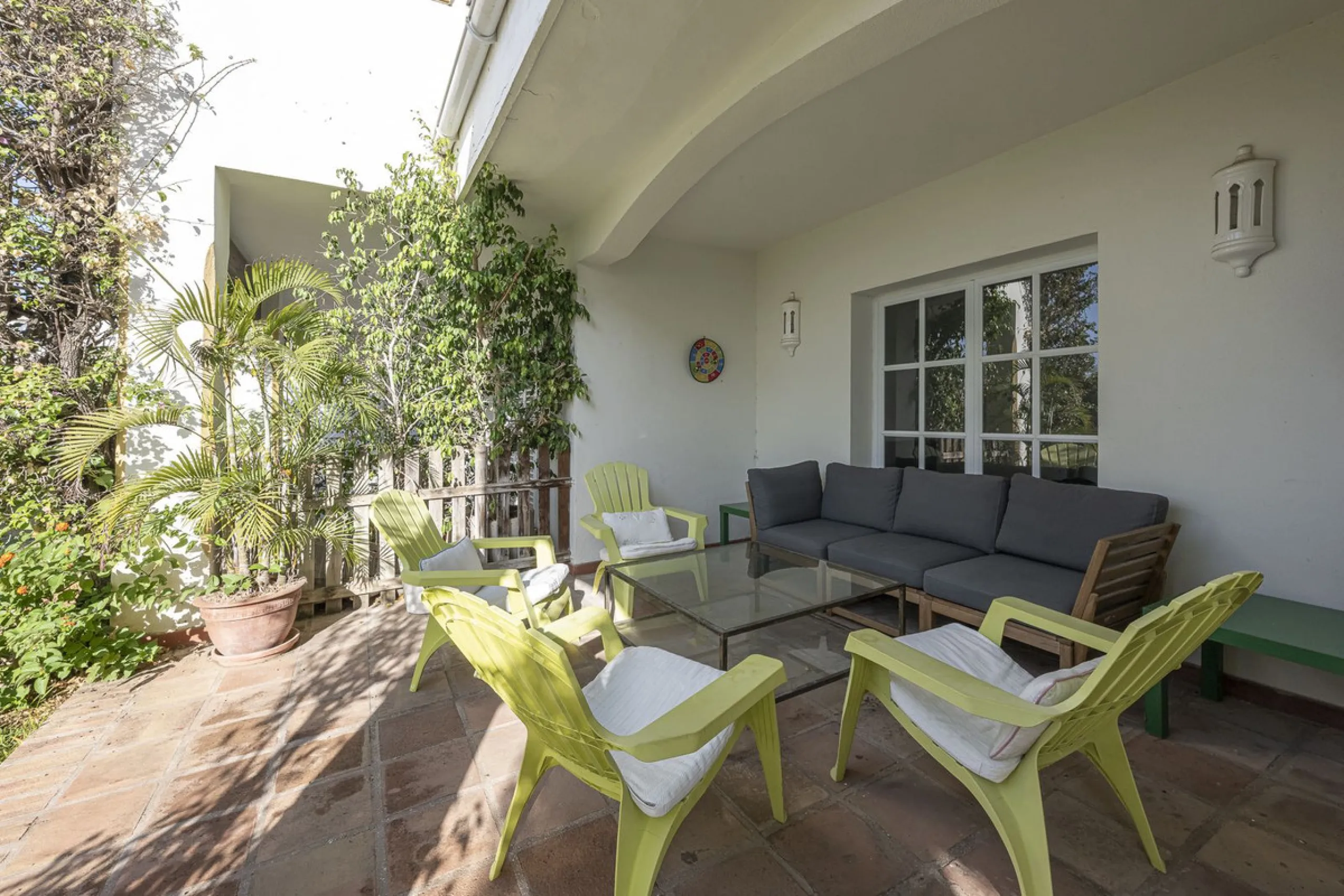 This stunning semi-detached villa is located in a traditional Andalusian development on the New Golden Mile. It is ideally located a short drive from Puerto Banús, with the beach just a short walk away.