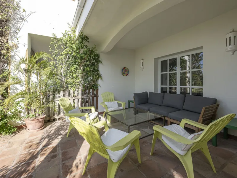 This stunning semi-detached villa is located in a traditional Andalusian development on the New Golden Mile. It is ideally located a short drive from Puerto Banús, with the beach just a short walk away.