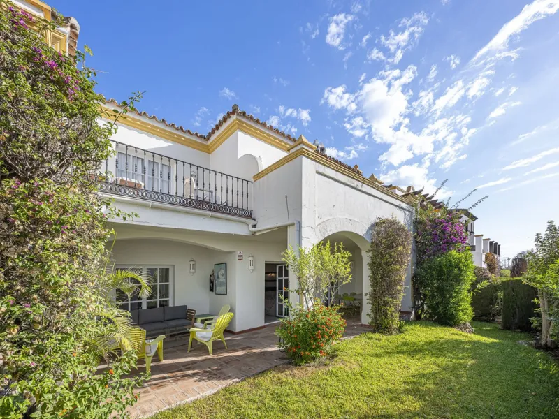 This stunning semi-detached villa is located in a traditional Andalusian development on the New Golden Mile. It is ideally located a short drive from Puerto Banús, with the beach just a short walk away.
