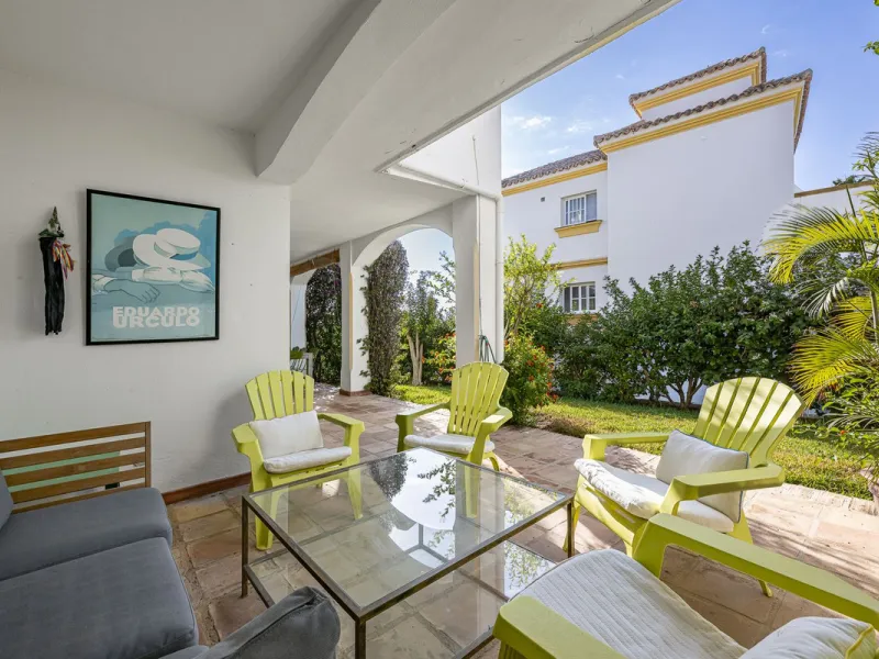 This stunning semi-detached villa is located in a traditional Andalusian development on the New Golden Mile. It is ideally located a short drive from Puerto Banús, with the beach just a short walk away.