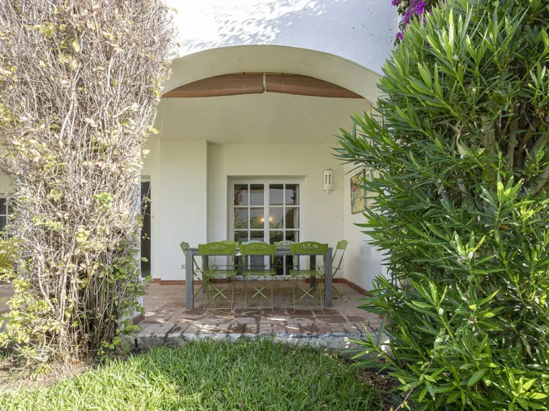 This stunning semi-detached villa is located in a traditional Andalusian development on the New Golden Mile. It is ideally located a short drive from Puerto Banús, with the beach just a short walk away.