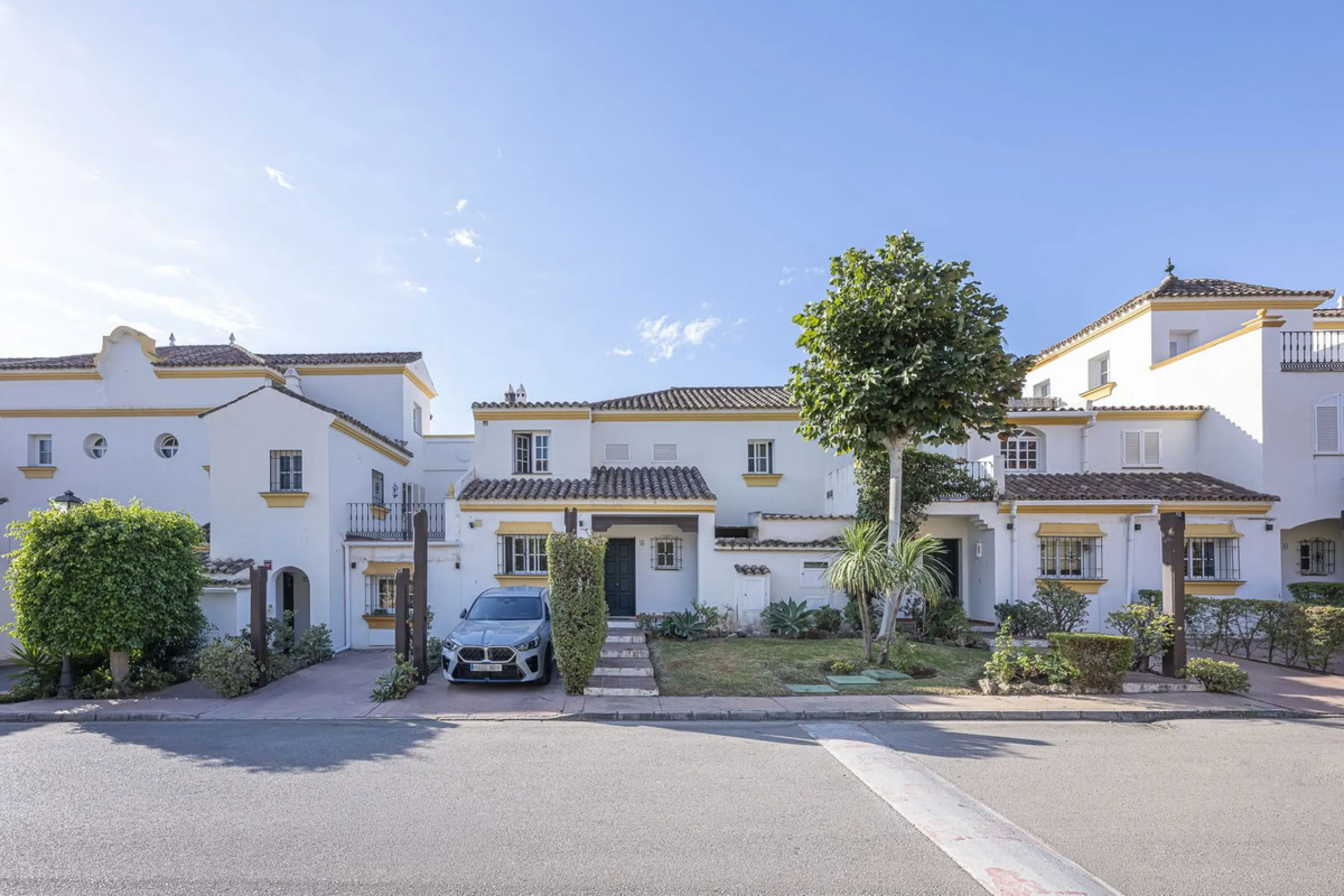 This stunning semi-detached villa is located in a traditional Andalusian development on the New Golden Mile. It is ideally located a short drive from Puerto Banús, with the beach just a short walk away.