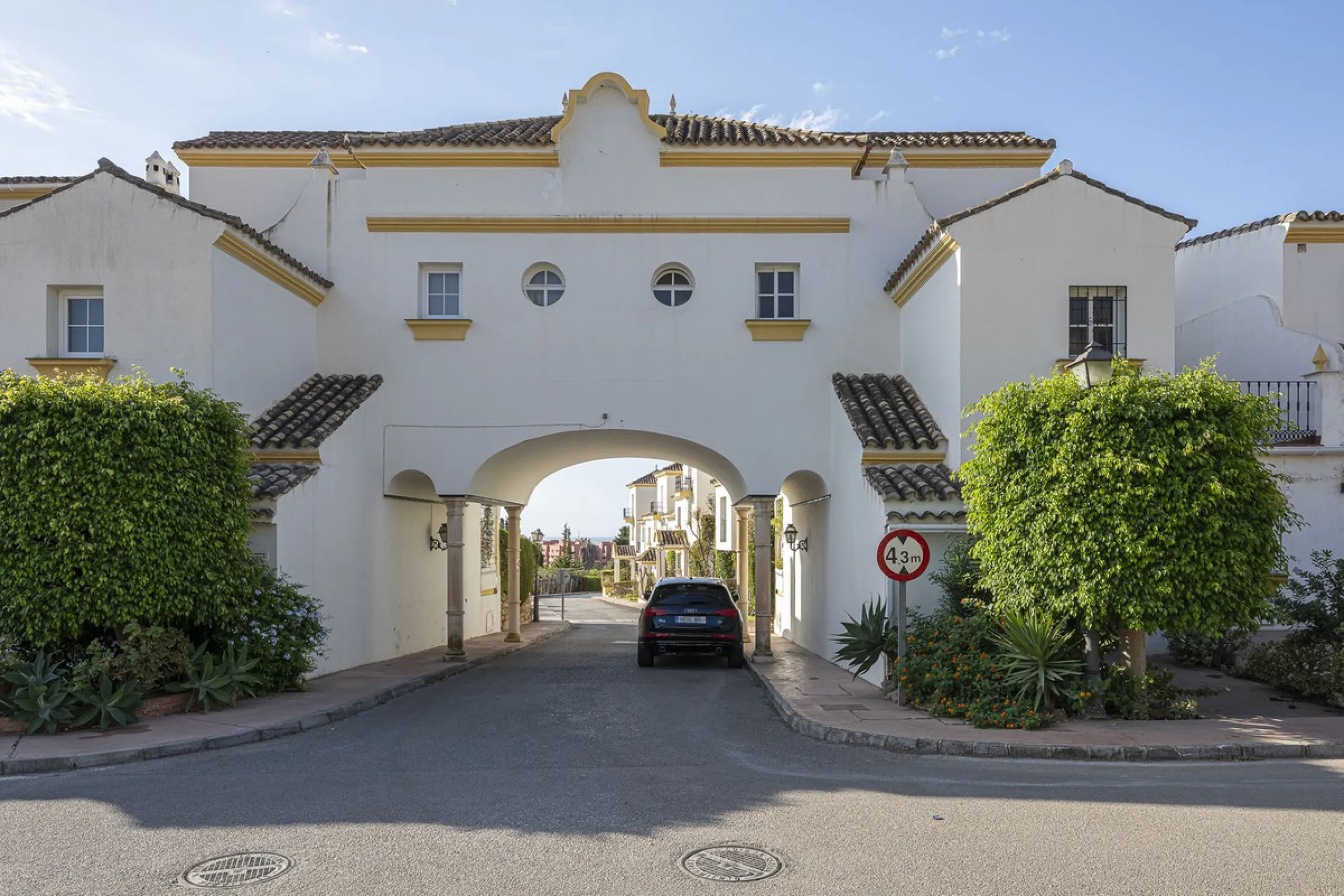 This stunning semi-detached villa is located in a traditional Andalusian development on the New Golden Mile. It is ideally located a short drive from Puerto Banús, with the beach just a short walk away.