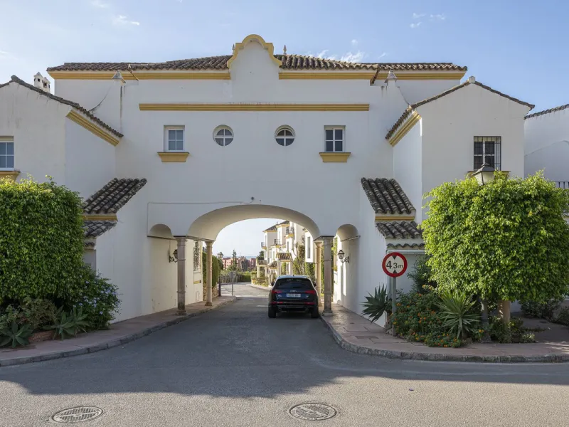 This stunning semi-detached villa is located in a traditional Andalusian development on the New Golden Mile. It is ideally located a short drive from Puerto Banús, with the beach just a short walk away.