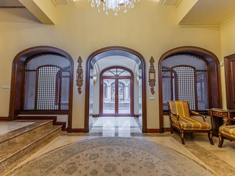 Luxury andalusian style villa that resides magnificently in one of the most prestigious and sought-after urbanizations in Marbella, Guadalmina Baja, only 100 meters from the beach and 5 minutes from Puerto Banus. The highest quality materials have been us