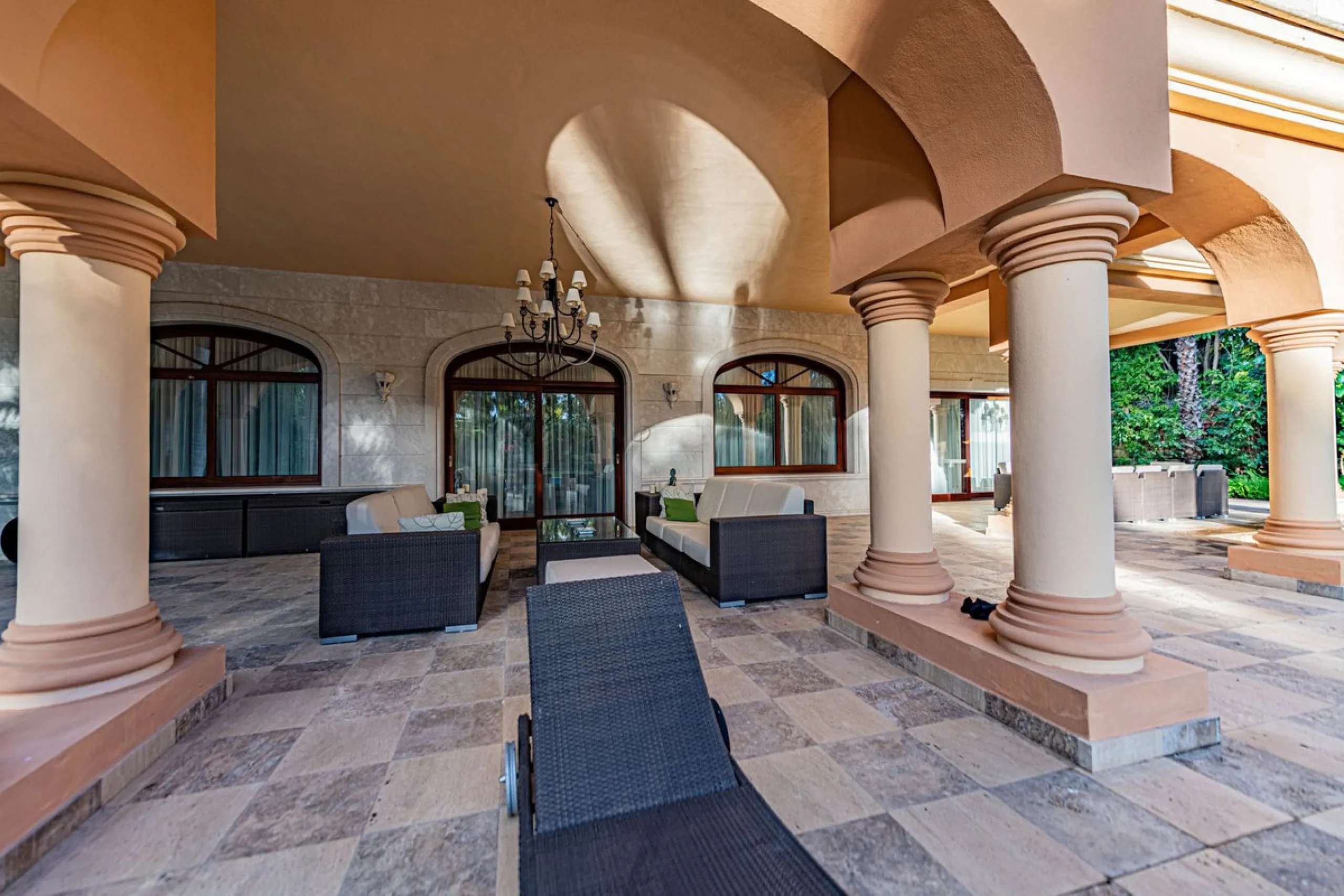 Luxury andalusian style villa that resides magnificently in one of the most prestigious and sought-after urbanizations in Marbella, Guadalmina Baja, only 100 meters from the beach and 5 minutes from Puerto Banus. The highest quality materials have been us