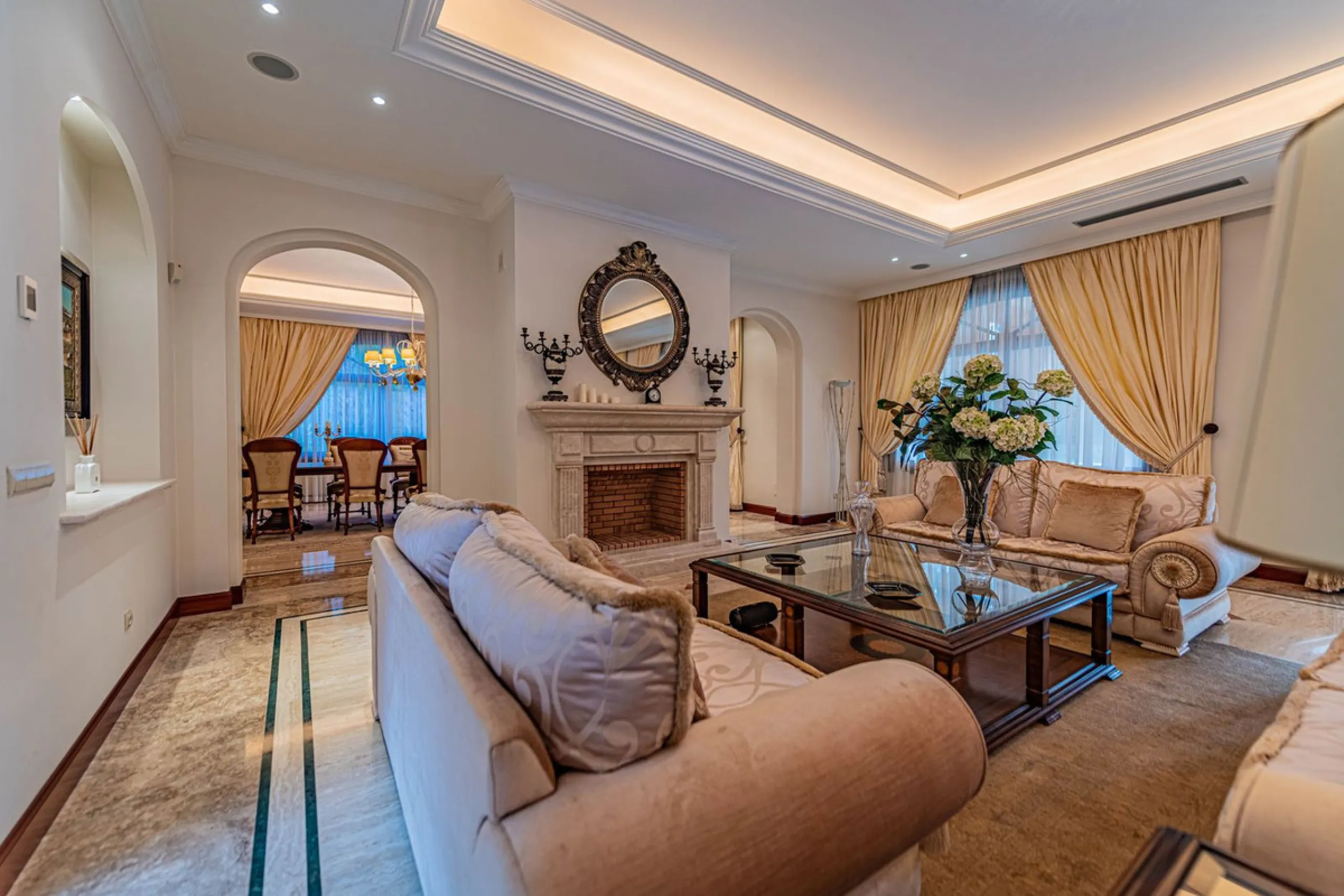 Luxury andalusian style villa that resides magnificently in one of the most prestigious and sought-after urbanizations in Marbella, Guadalmina Baja, only 100 meters from the beach and 5 minutes from Puerto Banus. The highest quality materials have been us