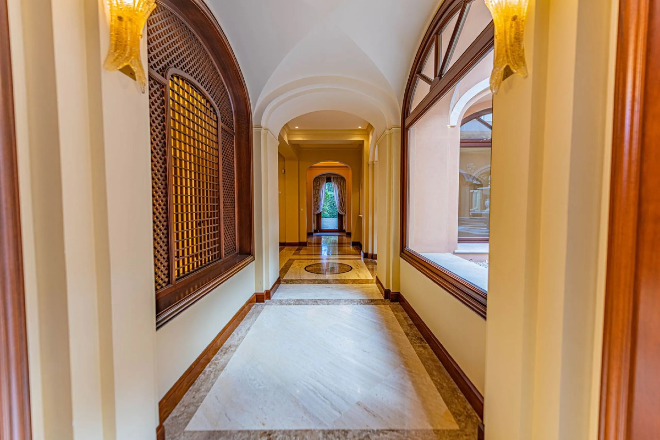 Luxury andalusian style villa that resides magnificently in one of the most prestigious and sought-after urbanizations in Marbella, Guadalmina Baja, only 100 meters from the beach and 5 minutes from Puerto Banus. The highest quality materials have been us