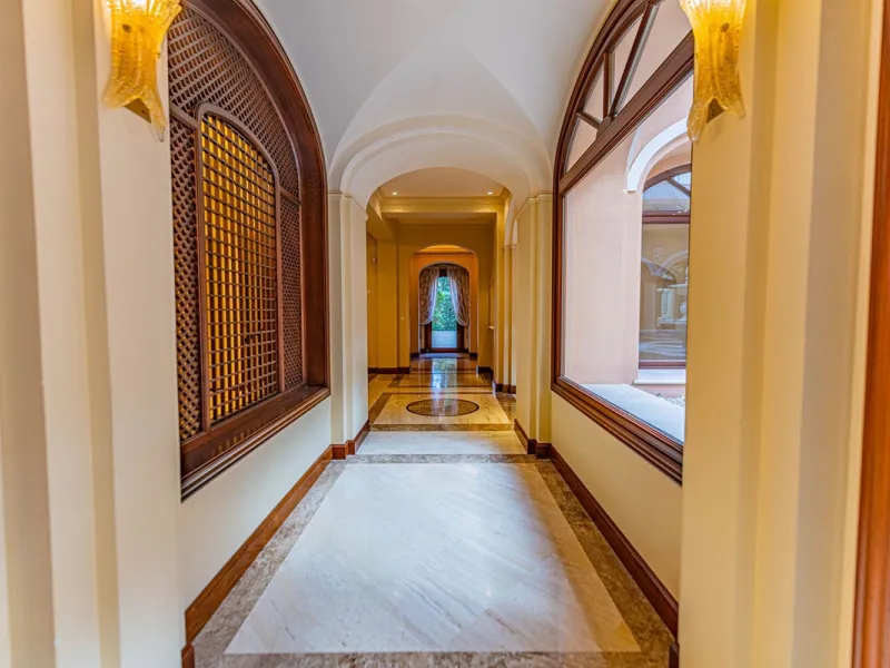Luxury andalusian style villa that resides magnificently in one of the most prestigious and sought-after urbanizations in Marbella, Guadalmina Baja, only 100 meters from the beach and 5 minutes from Puerto Banus. The highest quality materials have been us