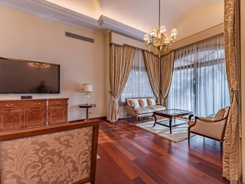 Luxury andalusian style villa that resides magnificently in one of the most prestigious and sought-after urbanizations in Marbella, Guadalmina Baja, only 100 meters from the beach and 5 minutes from Puerto Banus. The highest quality materials have been us