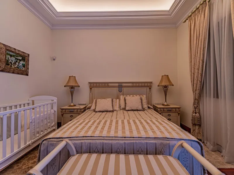 Luxury andalusian style villa that resides magnificently in one of the most prestigious and sought-after urbanizations in Marbella, Guadalmina Baja, only 100 meters from the beach and 5 minutes from Puerto Banus. The highest quality materials have been us