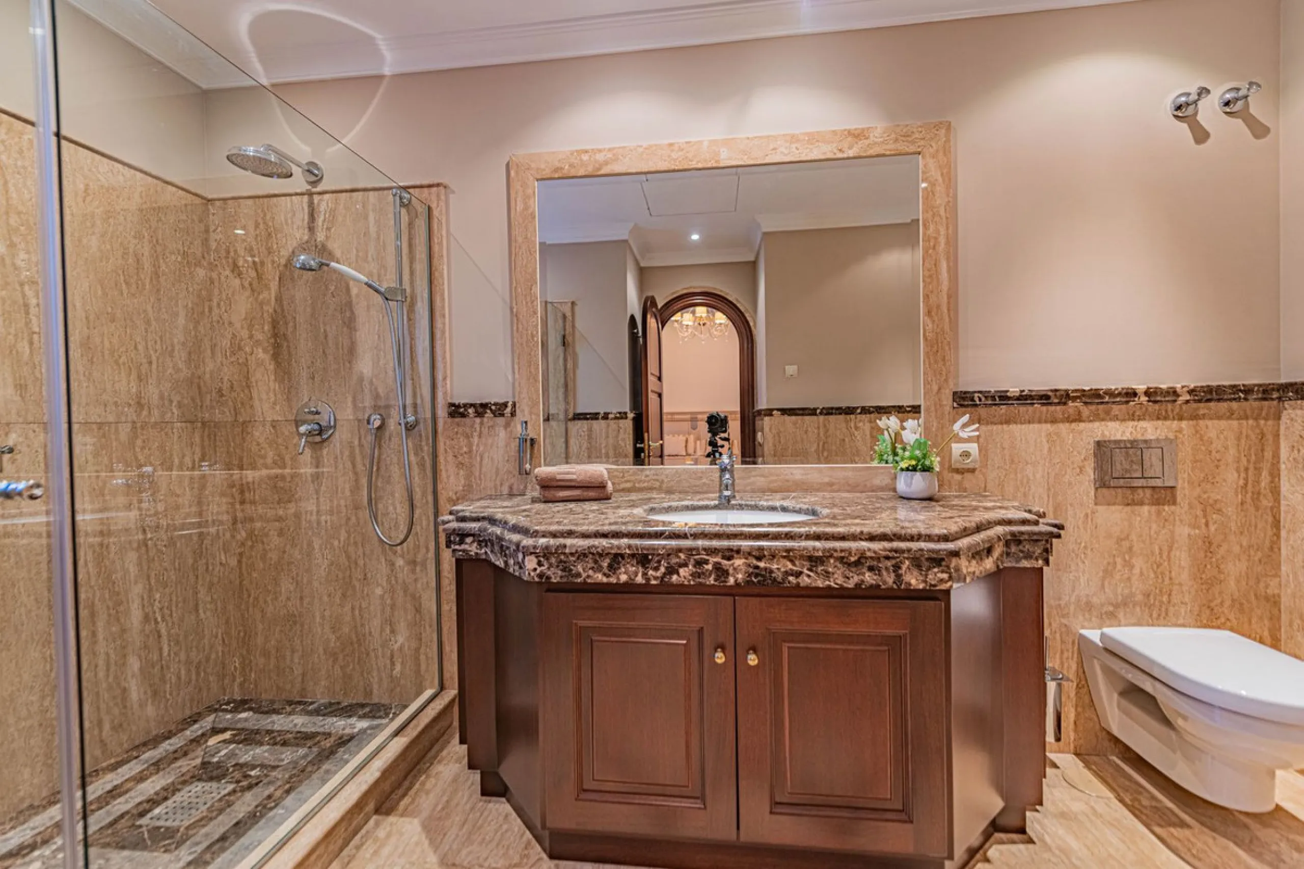 Luxury andalusian style villa that resides magnificently in one of the most prestigious and sought-after urbanizations in Marbella, Guadalmina Baja, only 100 meters from the beach and 5 minutes from Puerto Banus. The highest quality materials have been us